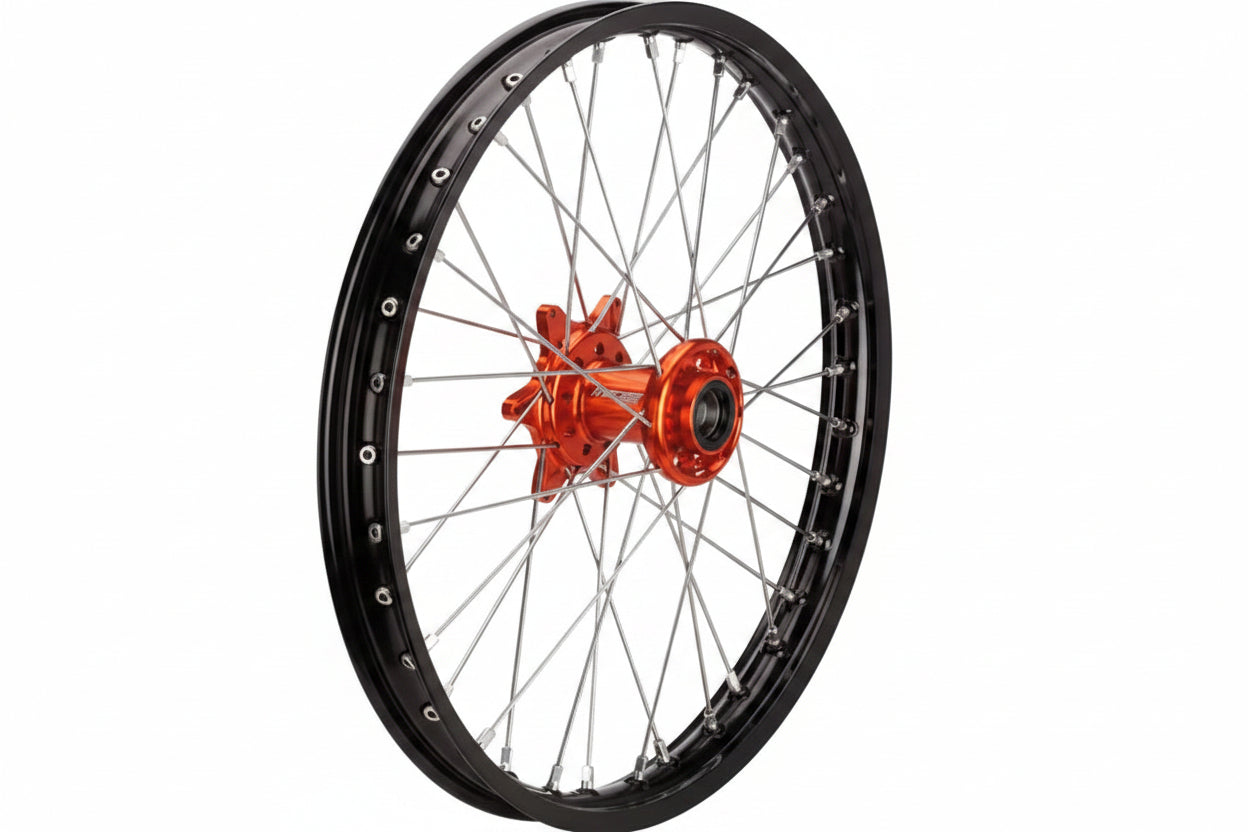 Motorcycle wheel with black rim and orange hub on a white background