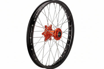 Motorcycle wheel with black rim and orange hub on a white background